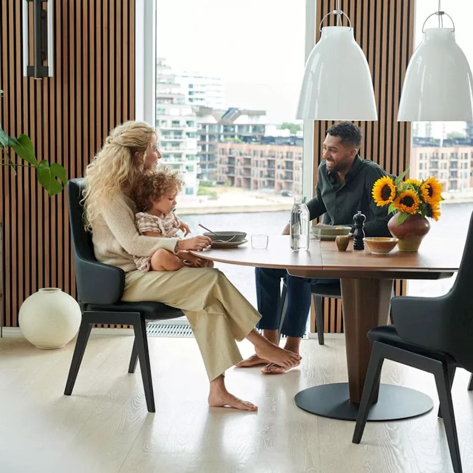 The Stressless line of dining chairs automatically adjusts its seat and back positions, without levers or handles. Lean forward, and the chair moves to reduce the pressure under your legs while supporting your back. Lean back, and enjoy the reclining backrest while the seat slides forward to provide a more open and comfortable sitting position.

 
